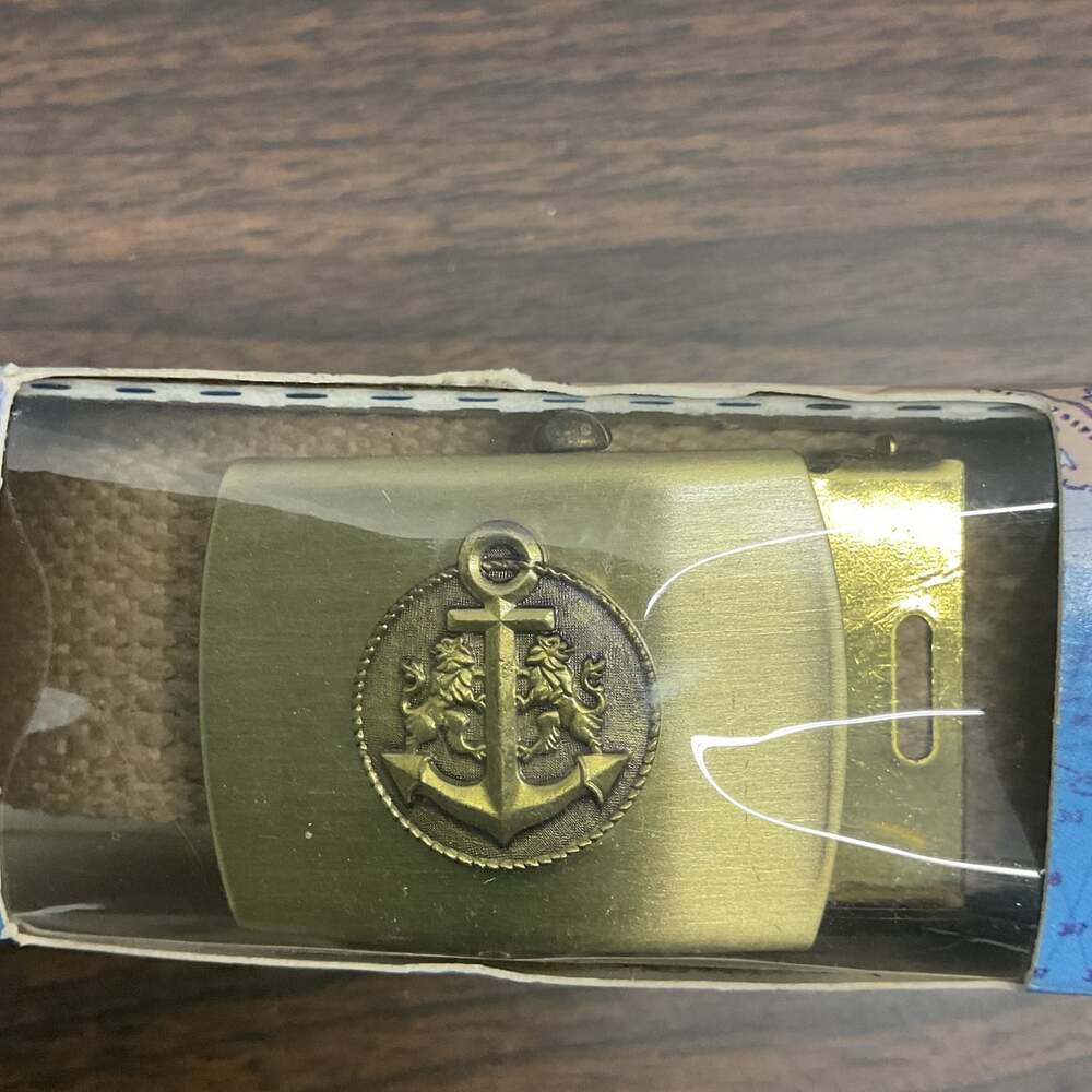 vintage Merit promotional brass belt buckle and webbed belt